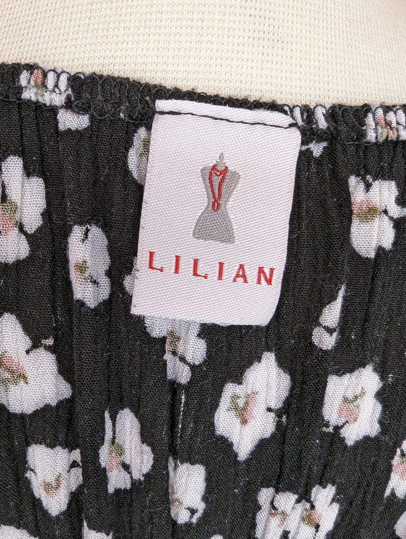 Lilian Size: S/M Romper
