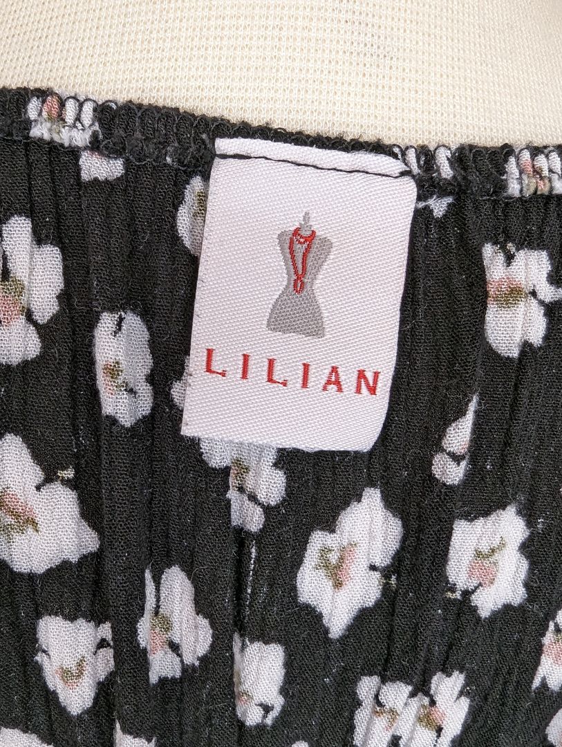 Lilian  Size: S/M Romper